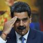 (FILES) In this file photo taken on February 14, 2020 Venezuela's President Nicolas Maduro gestures during a press conference