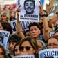 People demonstrate outside the Congress building in Buenos Aires to demand justice for the killers of 18-year-old Fernando Baez