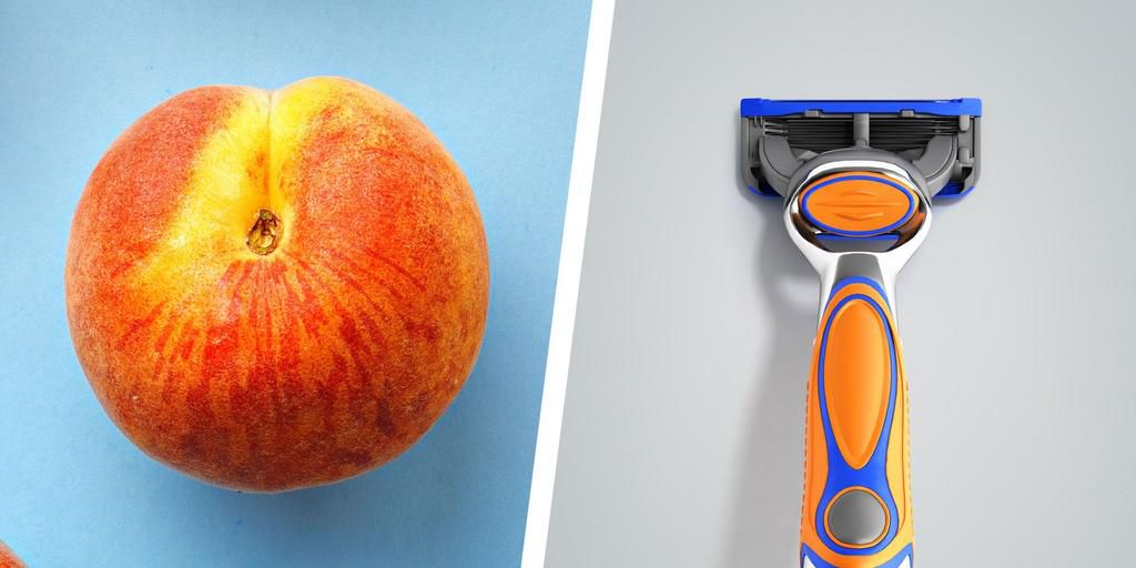 a peach next to a razor