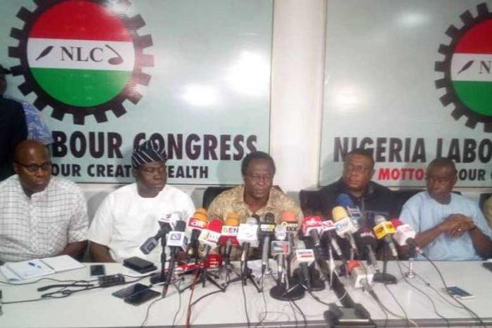 NLC-President-Ayuba-Wabba-middle-adressing-a-world-press-conference-at-its-headquarters-on-suspension-of-warning-strike-on-new-national-minimum-wage-e1538326508834