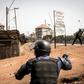 Policemen fired slingshots as an anti-Conde demonstration in Conakry last month turned violent