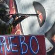 Riot police in Chile take aim at protesters during anti-government demonstrations in Santiago on February 21