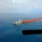 An aerial survey has so far shown no signs of mining ore contamination on the water's surface from the damaged MV Stellar Banner
