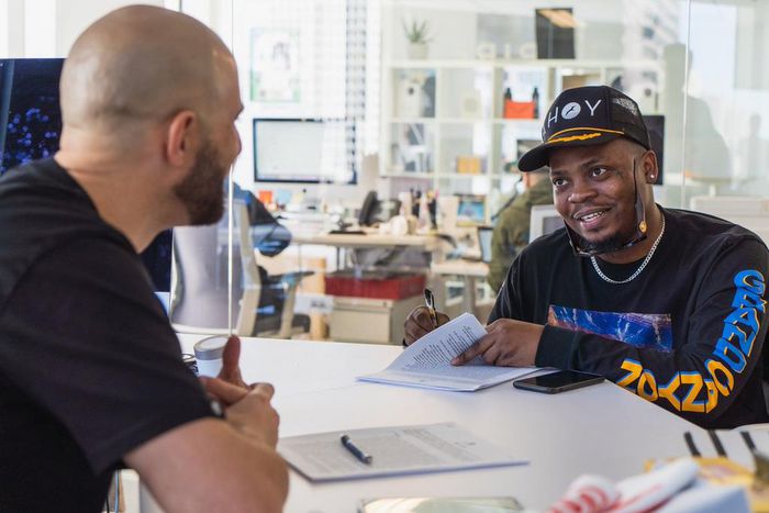 Olamide signs his deal with EMPIRE. (Twitter/Olamide_YBNL)