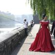 A couple pose for pre-wedding pictures at the north gate of the Palace Museum in Beijing