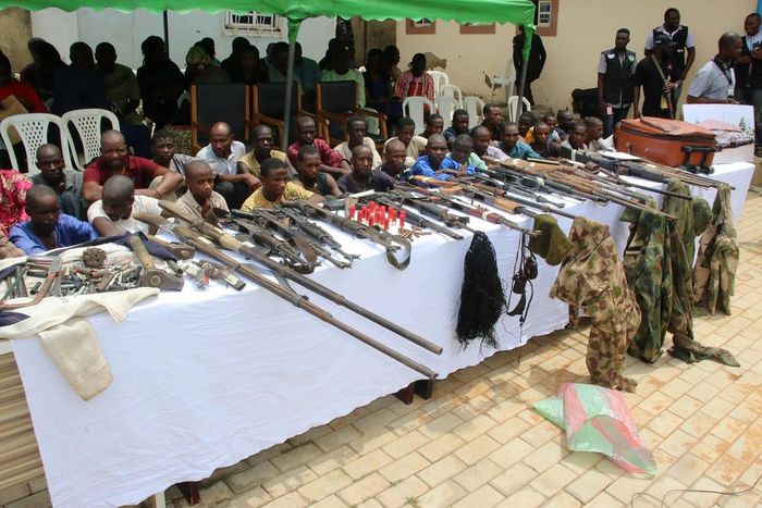 Criminal suspects paraded with arms and ammunition by the Nigeria Police Force in 2019 [NPF]