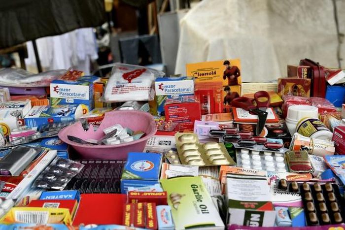 A drugs stall on a street in Lagos. Informal sales outlets are a major channel for counterfeit medicine