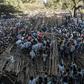 Hundreds had been sitting on a tiered wooden structure for hours when it collapsed