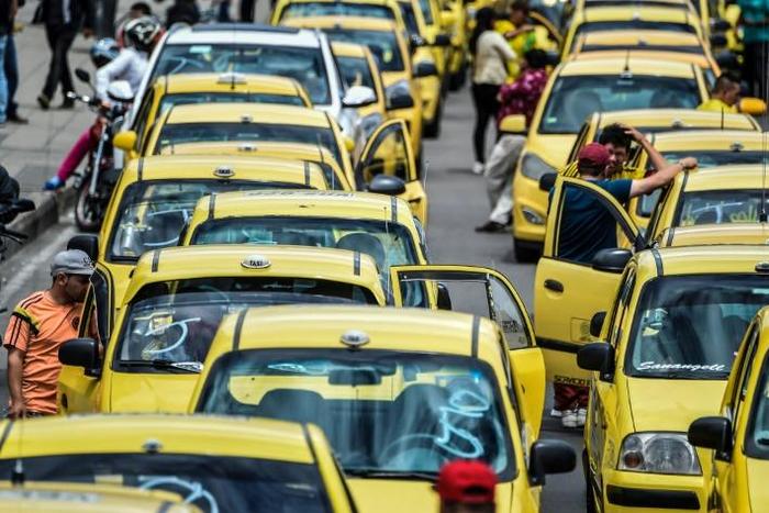 Taxi drivers protesting against Uber in Bogota in July 2019