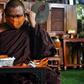 Thai monks are weaving recycled synthetic fibres with cotton into piles of saffron-coloured masks