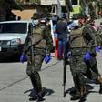 Soldiers assist health personnel in Tegucigalpa, Honduras on March 17, 2020 after two new cases of the new coronavirus were confirmed