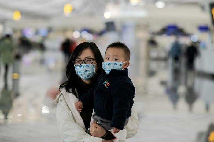 Airport health screenings have been stepped up across China and Asia, including at Beijing's Daxing airport, seen here -- in the US, five international airports will now check passengers arriving from the Chinese city of Wuhan
