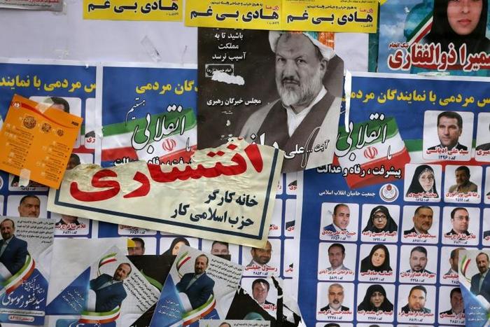 Iranians voted in a parliamentary election on Friday, two days after the announcement of an outbreak of the new coronavirus in the country