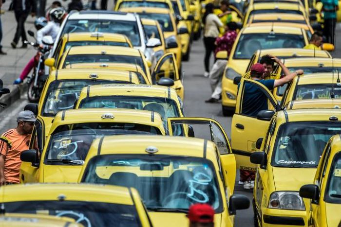 Taxi drivers protesting against Uber in Bogota in July 2019