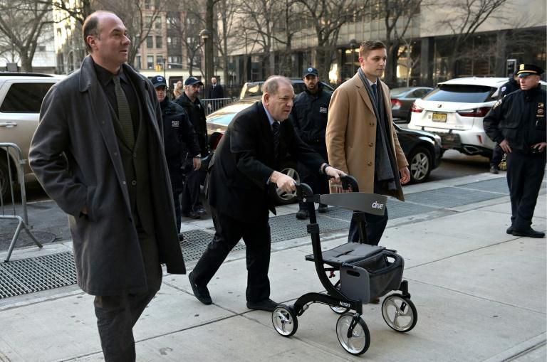 Harvey Weinstein (C), shown  arriving at the Manhattan Criminal Court on January 24, 2020, faces life imprisonment if convicted of predatory sexual assault charges related to two women