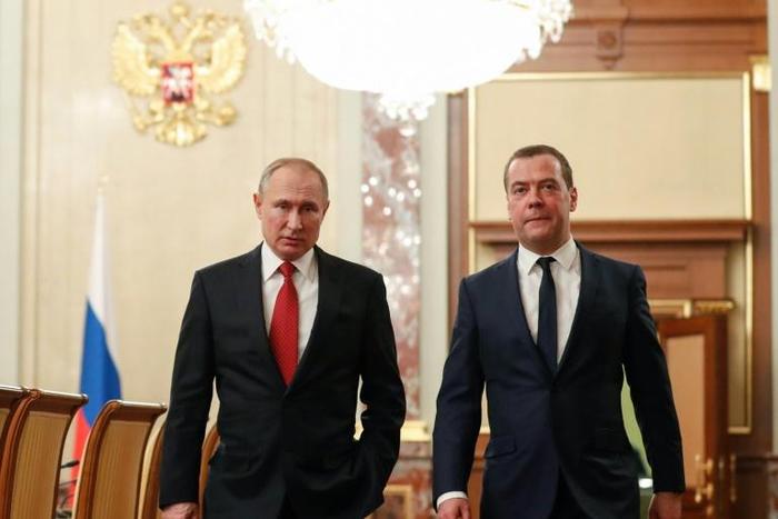 Russian President Vladimir Putin and Dmitry  Medvedev last week