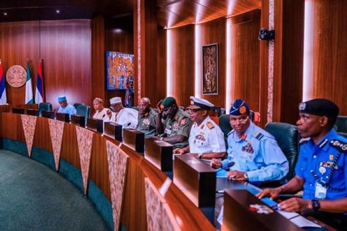 President Buhari at a meeting with the service chiefs