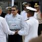Honduran President Juan Orlando Hernandez (center with sunglasses) takes part in a ceremony marking the arrival of a warship bought from Israel
