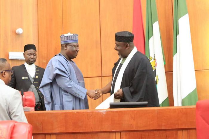 President of the Senate, Senator Ahmad Lawan swears in Rochas Okorocha [Twitter/@SPNigeria]