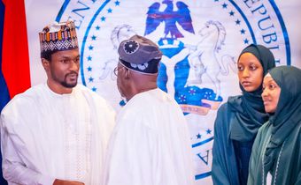 The late former President Muhammadu Buhari's only surviving son, Yusuf and President Bola Tinubu at a special FEC meeting.