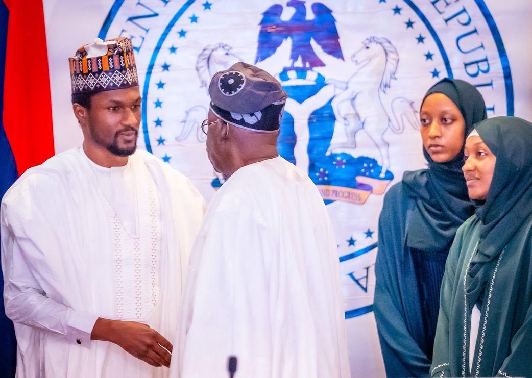 The late former President Muhammadu Buhari's only surviving son, Yusuf and President Bola Tinubu at a special FEC meeting.