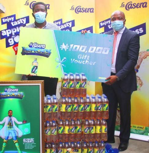 L-R: Bionic Shegz; Segun Adediji and Regional Sales Manager, The La Casera Company Christian Onah at the gift presentation in Lagos State.