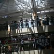 Pro-democracy supporters gather at a shopping mall during a lunchtime rally in Hong Kong on April 29