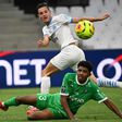 Wesley Fofana, in the famous green of Saint-Etienne, challenges Florian Thauvin during a recent game against Marseille