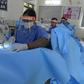 Women from the GMR Varalakshmi Foundation stitch Personal Protective Equipment for frontline coronavirus workers in Hyderabad