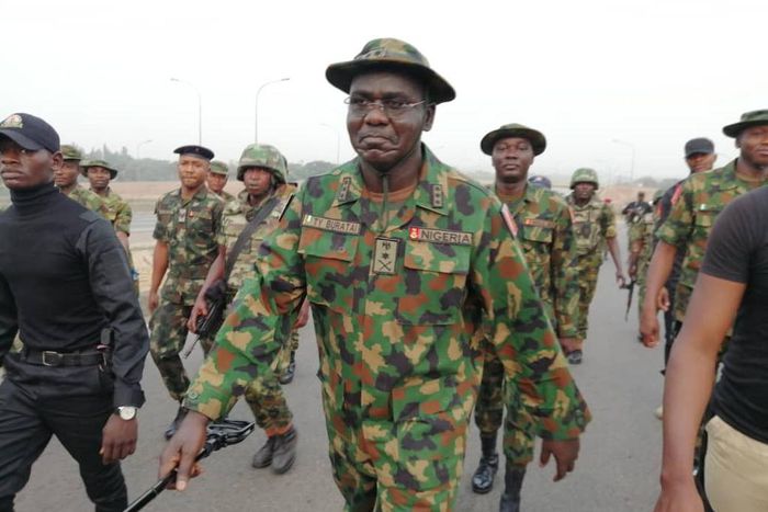 Chief of Army staff Lit-Gen. Tukur Buratai leading troops out on a parade [Twitter/@HQNigerianArmy]
