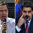 Venezuelan President Nicolas Maduro (R) has pardoned more than 100 lawmakers and associates of opposition leader Juan Guaido