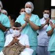 Second Lieutenant Ermando Piveta, who served in the Brazilian artillery in Africa during World War II, was brought out of the Armed Forces Hospital in Brasilia to a burst of trumpet music and applause after recovering from the new coronavirus