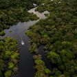 A boat travels on the Jurura river in Carauari, in the heart of the Brazilian Amazon rainforest, in March 2020 -- the entire region is facing many challenges, and now must battle the coronavirus crisis as well