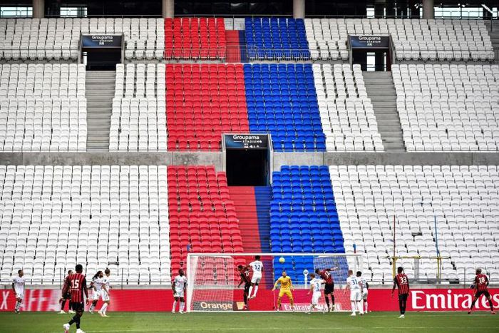 Quiet return: Lyon and Nice played a friendly in as empty stadium
