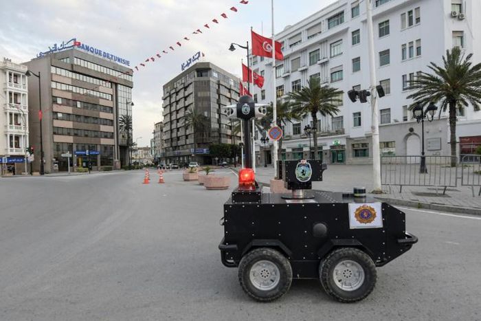 A Tunisian police robot patrols the streets of the capital Tunis to enforce a nationwide lockdown imposed by the authorities in their fight against coronavirus