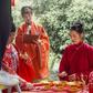 Chinese couple Ma Jialun (L) and Zhang Yitong (R) livestreamed their wedding to more than 100,000 people