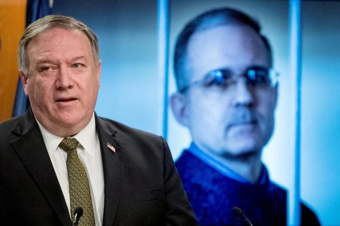 Secretary of State Mike Pompeo holds a news conference in front of an image of Paul Whelan, a former US marine who was arrested for alleged spying in Moscow