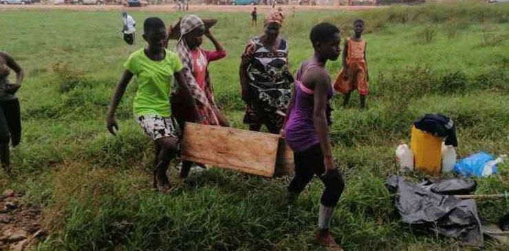 Families storm cemetery to pick exhumed corpses of relatives