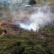 A handout picture from Colombia's Defence Ministry shows smoke billowing from the Sierra de La Macarena National Natural Park, Colombia, in 2019. The Latin America country has lost hundreds of thousands of hectares of forest in recent years
