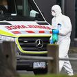 An ambulance is seen outside one of nine public housing estates locked down due to a spike in COVID-19 coronavirus numbers in Melbourne