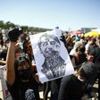 Many protesters against President Jair Bolsonaro in Brasilia were dressed in black and wore face masks