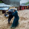 A flooded street in Haiti during the passage of Tropical Storm Laura, which is forecast to strengthen into a hurricane
