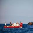A picture released by German migrant rescue NGO Sea-Eye shows an operation to rescue people in distress off the Libyan coast in April