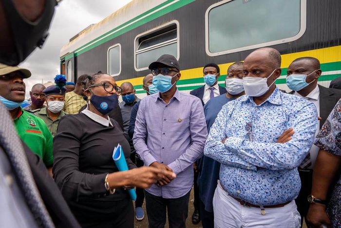 Lagos State governor, Babajide Sanwo-Olu (middle), and the Minister of Transportation, Rotimi Amaechi (right) [LASG]