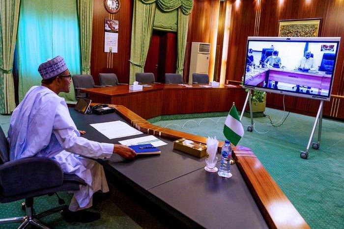 President Muhammadu Buhari receiving updates from the Presidential Task Force on Coronavirus via teleconferencing. [Twitter/@BashirAhmaad]