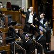 Senators in Chile give the thumbs up as they vote on pension reform