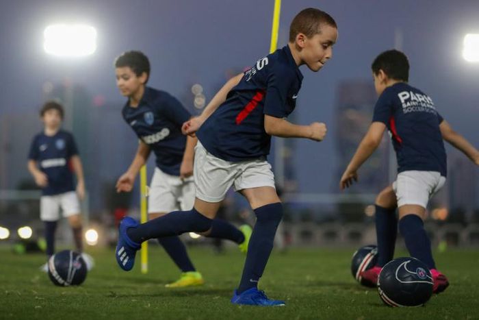 Stars of the future? Boys with the under-12 group train at the Paris Saint-Germain (PSG) Football Academy in Doha on the eve of the Champions League final
