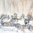 Some of the accused in the courtroom watched the images, while others looked away