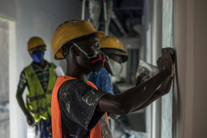 Masons and painters have been putting the finishing touches on the building, which is roughly the size of a hypermarket