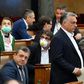 Hungarian Prime Minister Viktor Orban (centre) has said that ruling by decree allowed him to respond quickly and effectively during the virus emergency